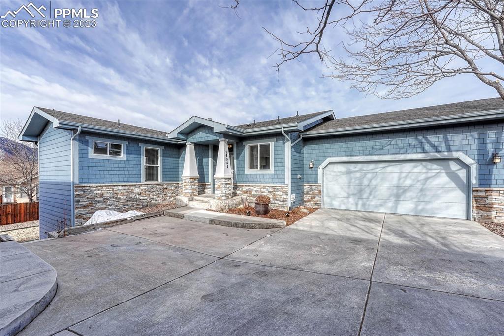 a backyard of a house with seating space