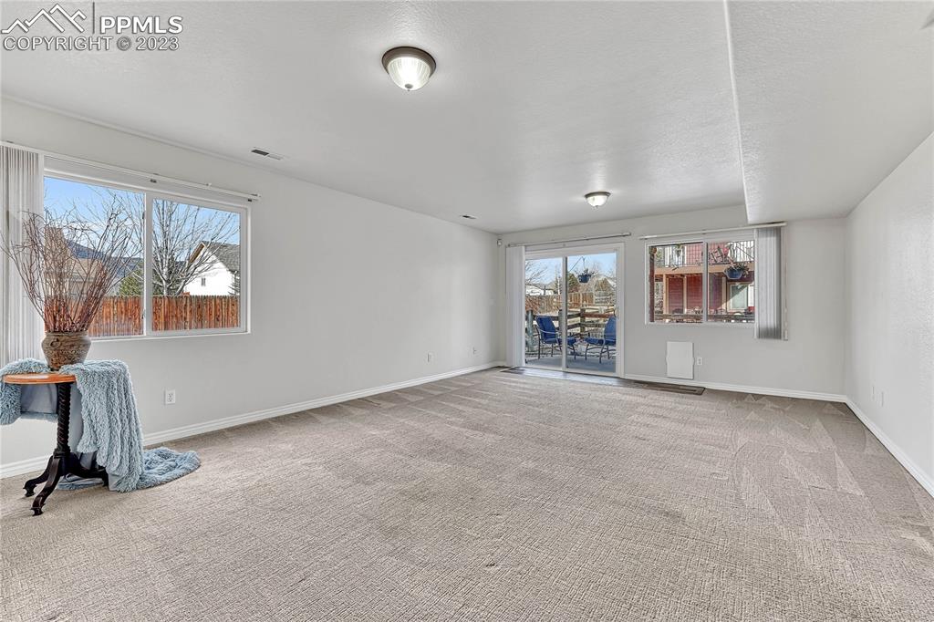 16946 Buffalo Valley Path Monument, CO 80132 - Photo 26 of 41 an empty room with windows