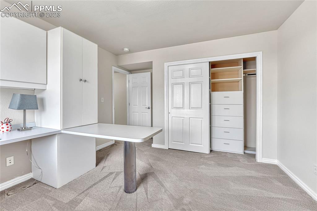 16946 Buffalo Valley Path Monument, CO 80132 - Photo 36 of 41 a view of an empty room with closet and cabinet