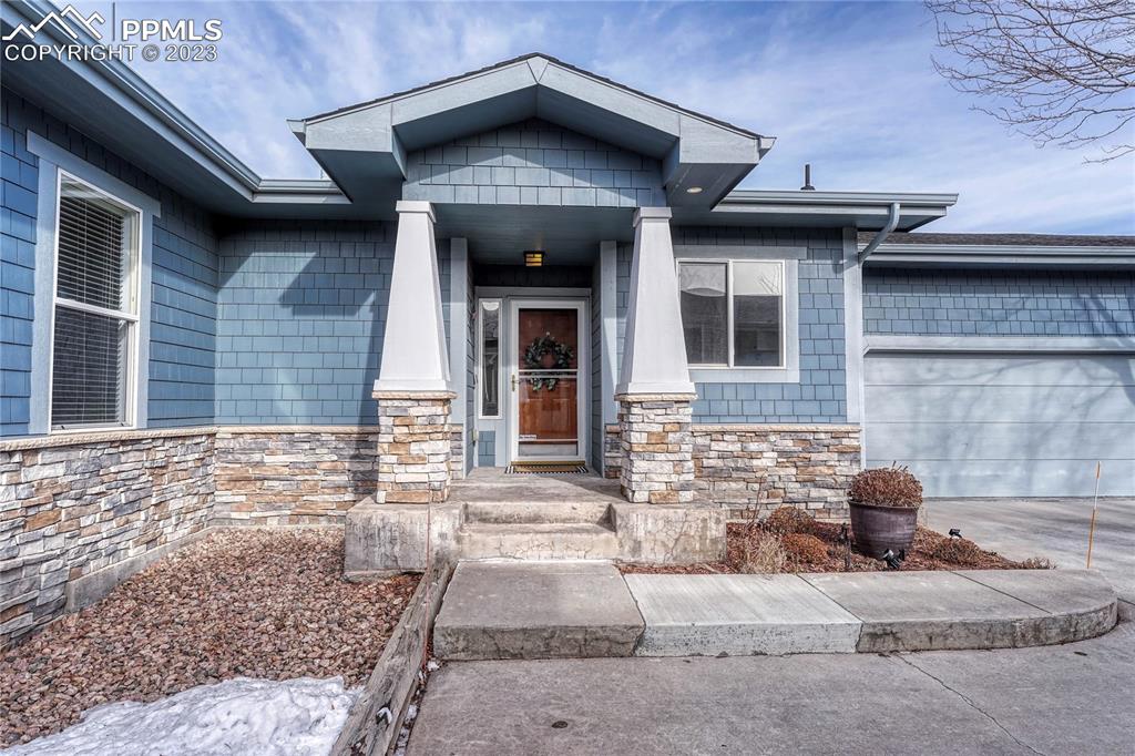 16946 Buffalo Valley Path Monument, CO 80132 - Photo 4 of 41 a front view of a house with a yard