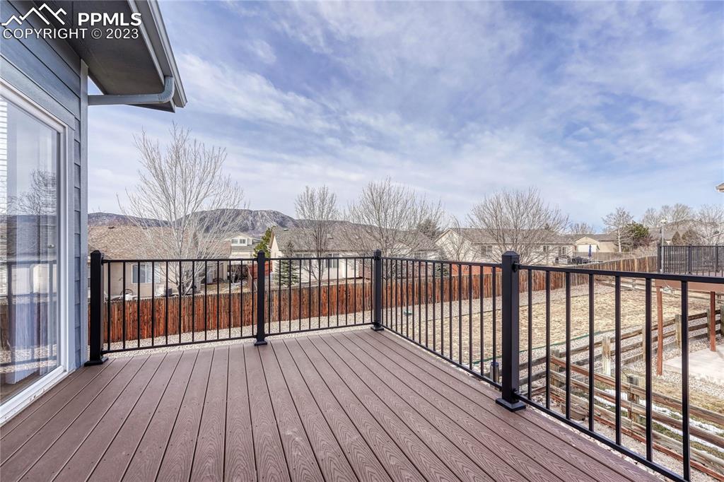 16946 Buffalo Valley Path Monument, CO 80132 - Photo 9 of 41 a view of a balcony with wooden floor
