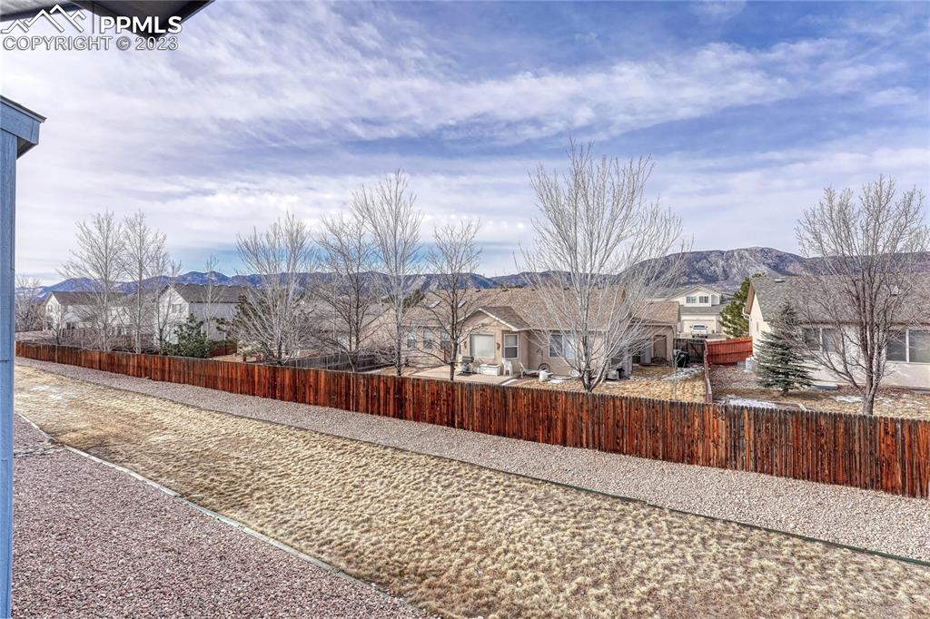 16946 Buffalo Valley Path Monument, CO 80132 - Photo 10 of 41 a view of a yard covered with snow in the background