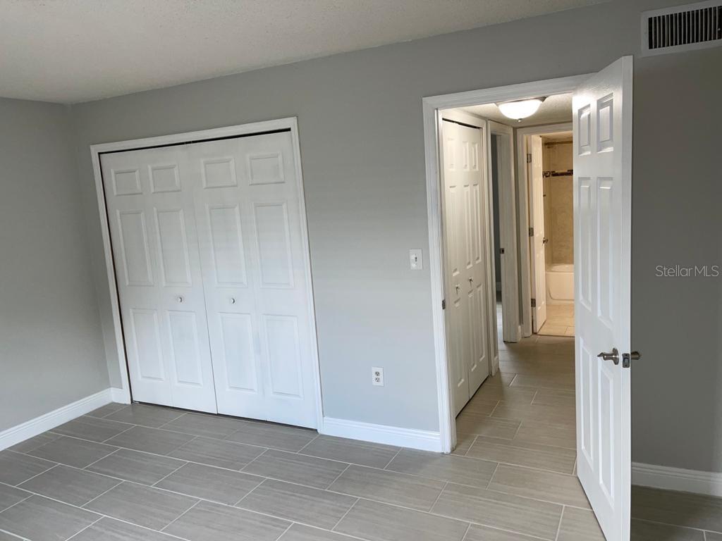 5325 Curry Ford Road, Unit B101 Orlando, FL 32812 - Photo 11 of 22 a view of a bathroom with closet area