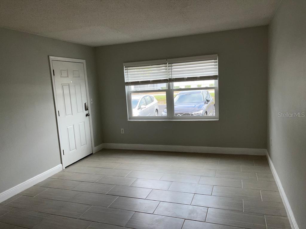 5325 Curry Ford Road, Unit B101 Orlando, FL 32812 - Photo 13 of 22 a view of an empty room with a window