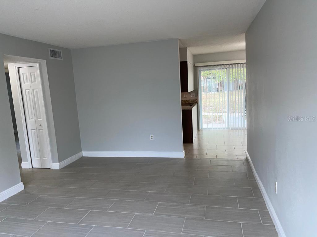 5325 Curry Ford Road, Unit B101 Orlando, FL 32812 - Photo 6 of 22 a view of an empty room and window