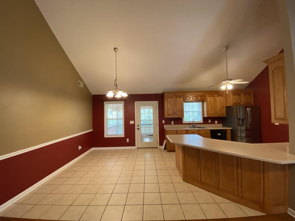 277 Harper Lane Royston, GA 30662 - Photo 12 of 42 a large room with mirror and window