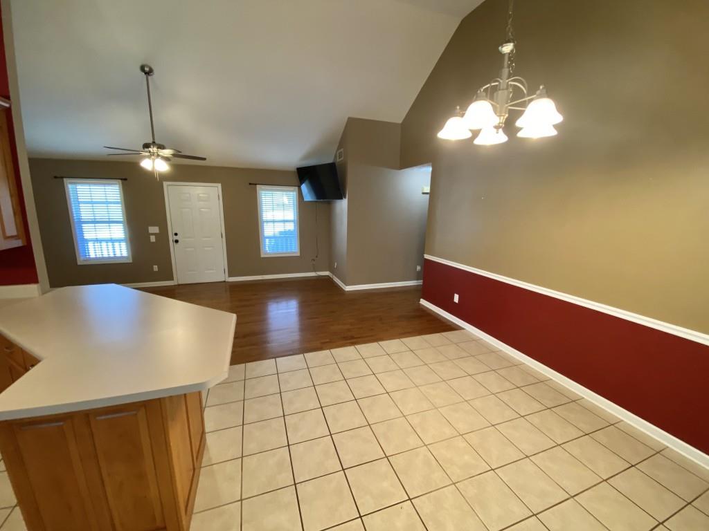 277 Harper Lane Royston, GA 30662 - Photo 13 of 42 a view of an empty room with window and wooden floor