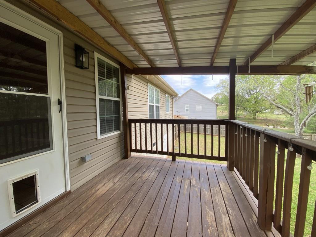 277 Harper Lane Royston, GA 30662 - Photo 34 of 42 a view of a balcony with wooden floor