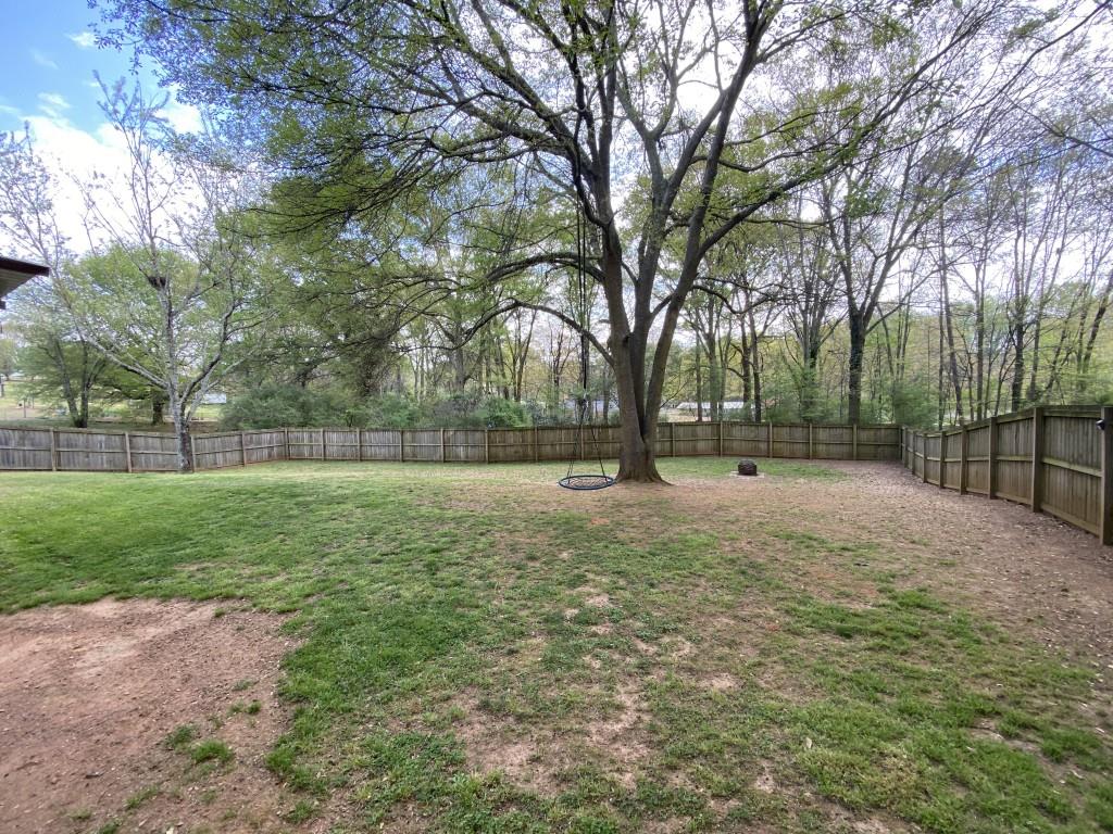 277 Harper Lane Royston, GA 30662 - Photo 36 of 42 a view of outdoor space with deck and trees