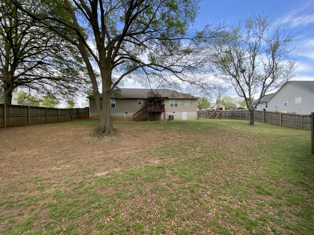 277 Harper Lane Royston, GA 30662 - Photo 38 of 42 a view of a house with a yard