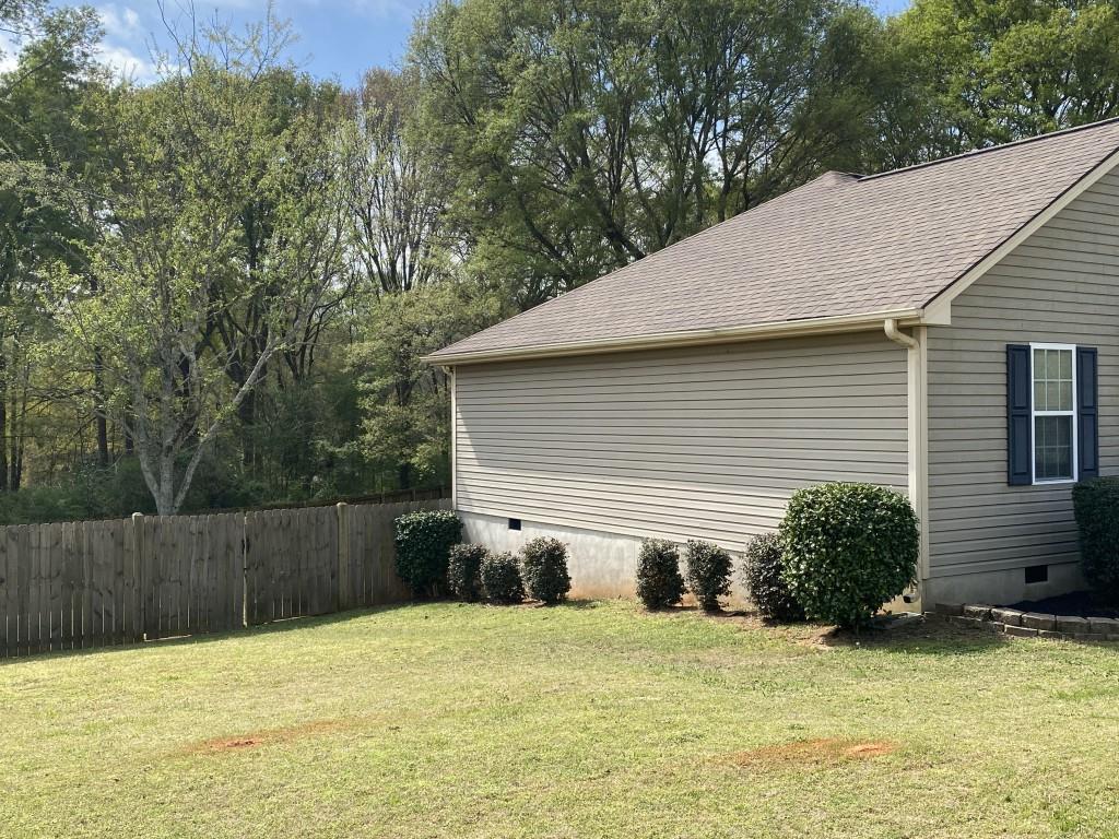 277 Harper Lane Royston, GA 30662 - Photo 4 of 42 a house with trees in the background
