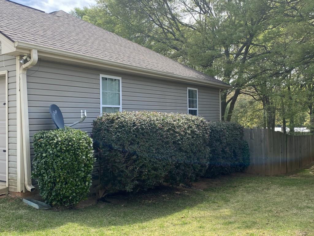 277 Harper Lane Royston, GA 30662 - Photo 5 of 42 a backyard of a house with lots of green space