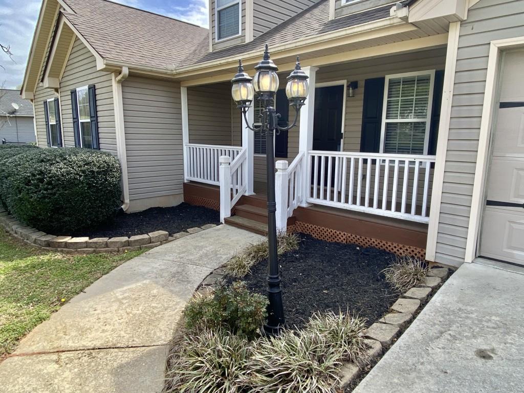 277 Harper Lane Royston, GA 30662 - Photo 6 of 42 a view of a house with a yard