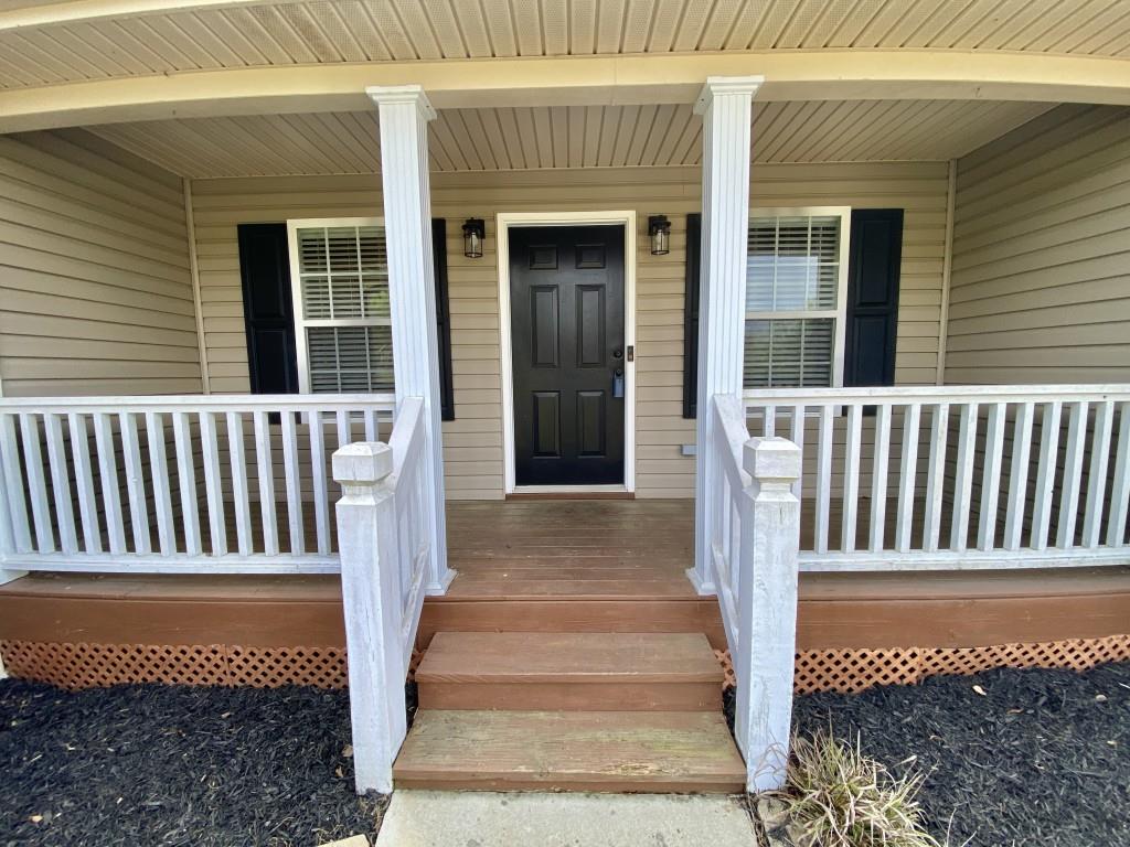 277 Harper Lane Royston, GA 30662 - Photo 7 of 42 a view of a house with a bench