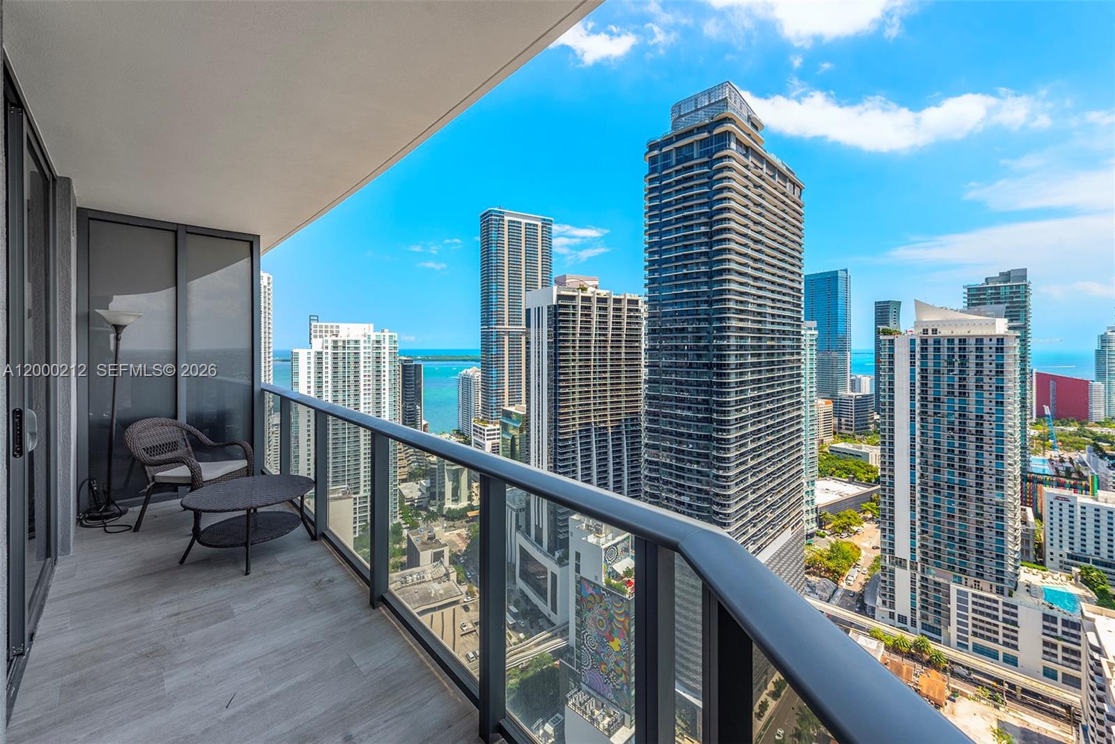 45 Southwest 9th Street, Unit 4006 Miami, FL 33130 - Photo 18 of 62 a view of balcony with furniture