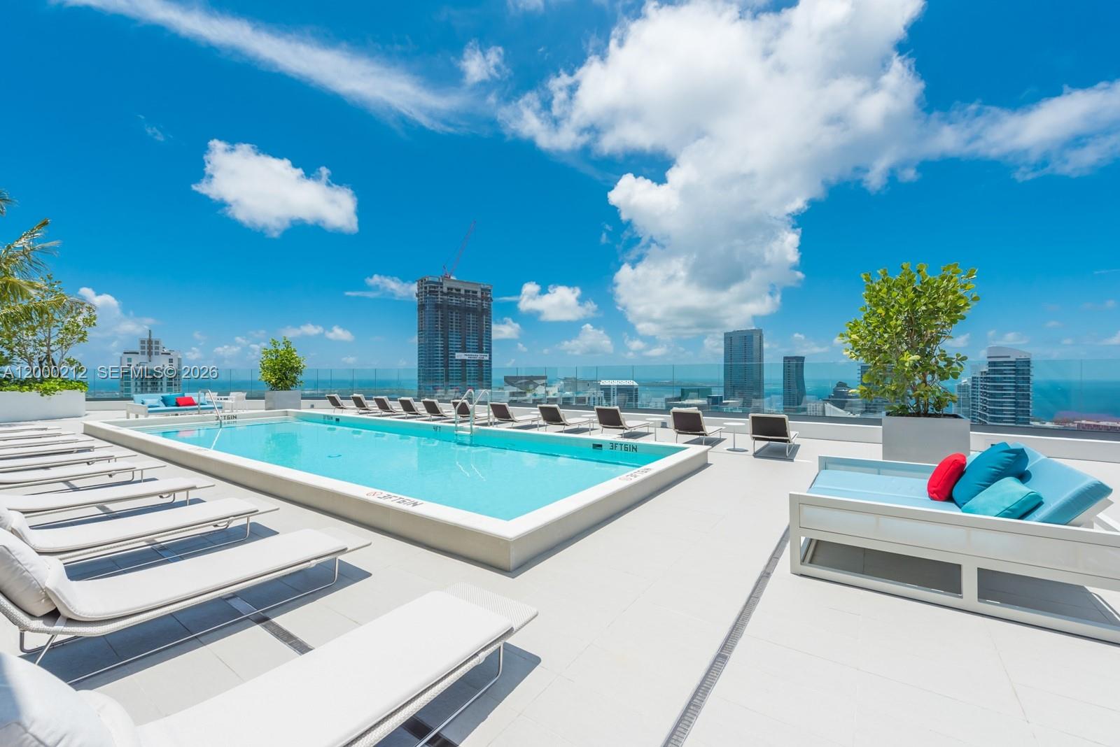 45 Southwest 9th Street, Unit 4006 Miami, FL 33130 - Photo 30 of 62 a view of a terrace with outdoor seating