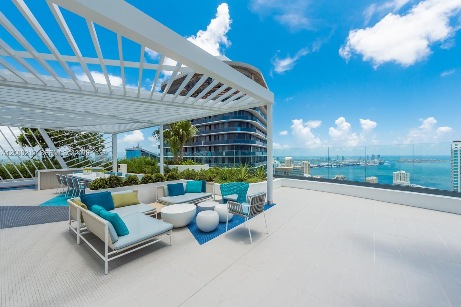45 Southwest 9th Street, Unit 4006 Miami, FL 33130 - Photo 31 of 62 a building outdoor space with patio furniture and potted plants