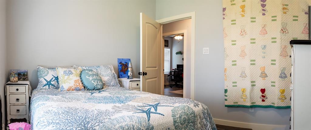 14910 Old Stoney Road Ponder, TX 76259 - Photo 22 of 36 a bedroom with a bed and a dresser