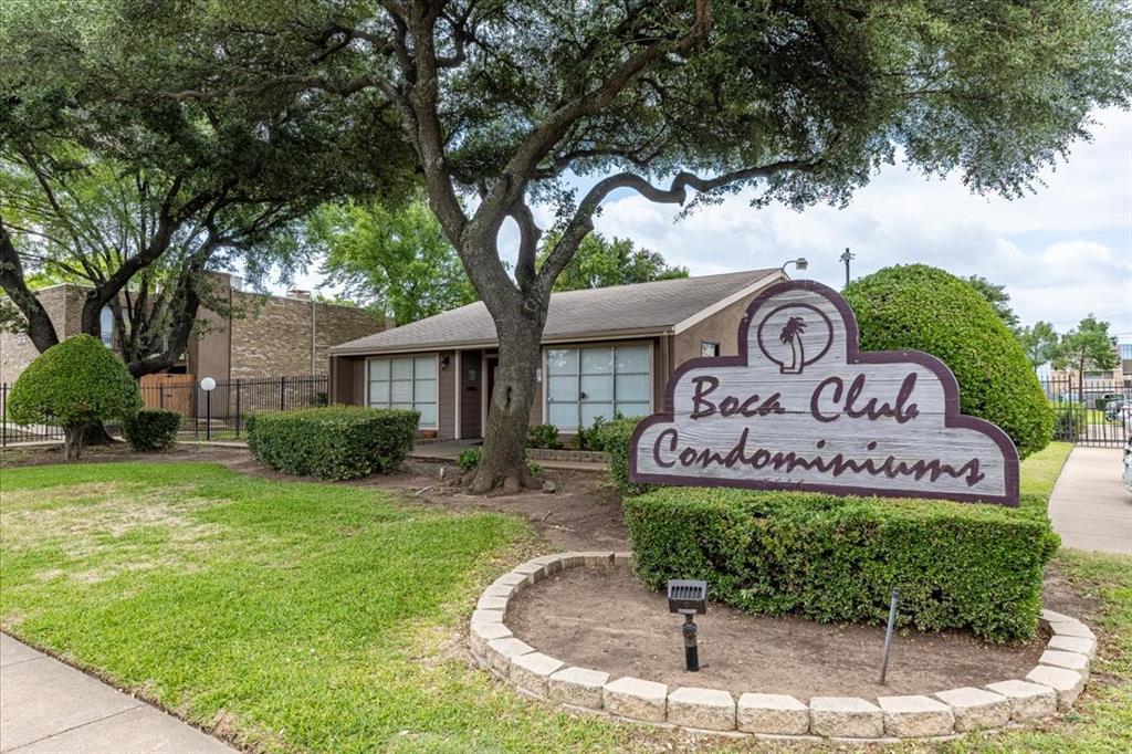 a sign on the side of the house