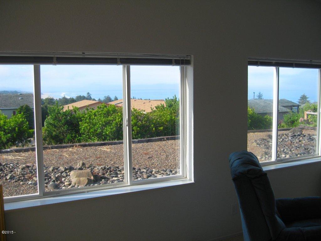 628 Northeast 57th Street Newport, OR 97365 - Photo 6 of 18 Wall of windows