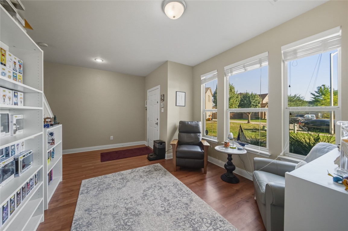 2207 Lauren Loop Leander, TX 78641 - Photo 3 of 26 a living room with furniture and a large window