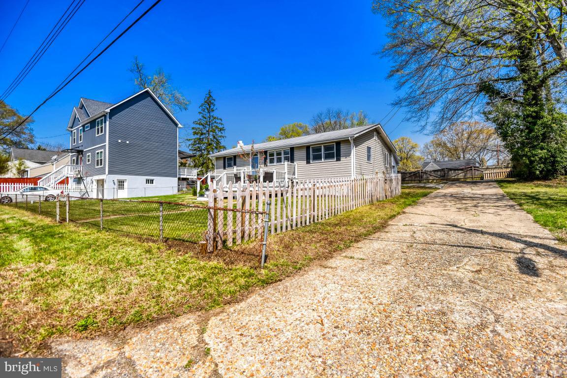 1715 Tacoma Road Edgewater, MD 21037 - Photo 1 of 1 a view of a house with a yard