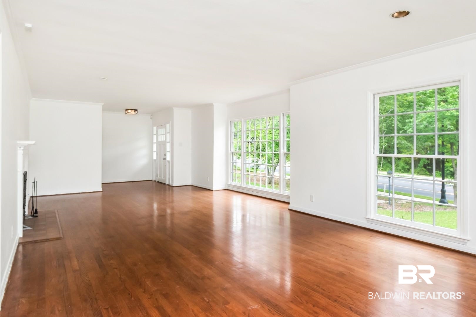 4 Turnout Lane Mobile, AL 36608 - Photo 18 of 53 Unfurnished living room with ornamental molding, dark wood-type flooring, and recessed lighting