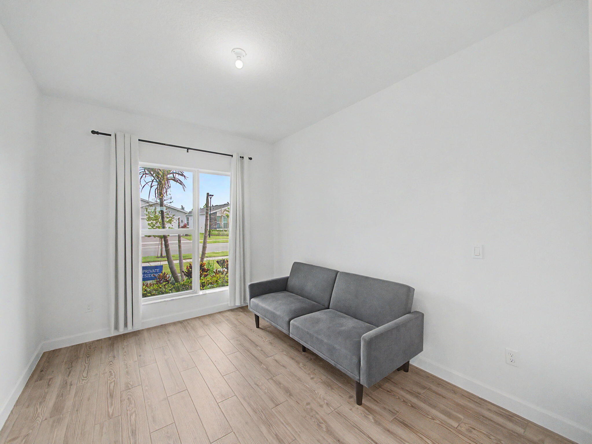 9140 Remy Lane Port St. Lucie, FL 34987 - Photo 8 of 16 Sitting Room