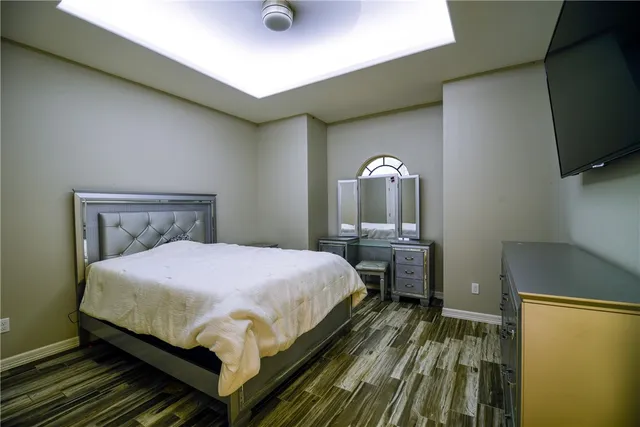 a bedroom with a bed and a view of bathroom