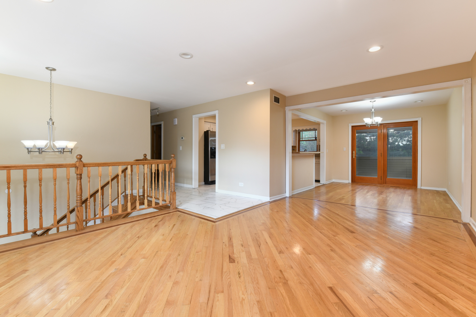 310 Dancing Water Court Carol Stream, IL 60188 - Photo 4 of 26 a view of a room with wooden floor
