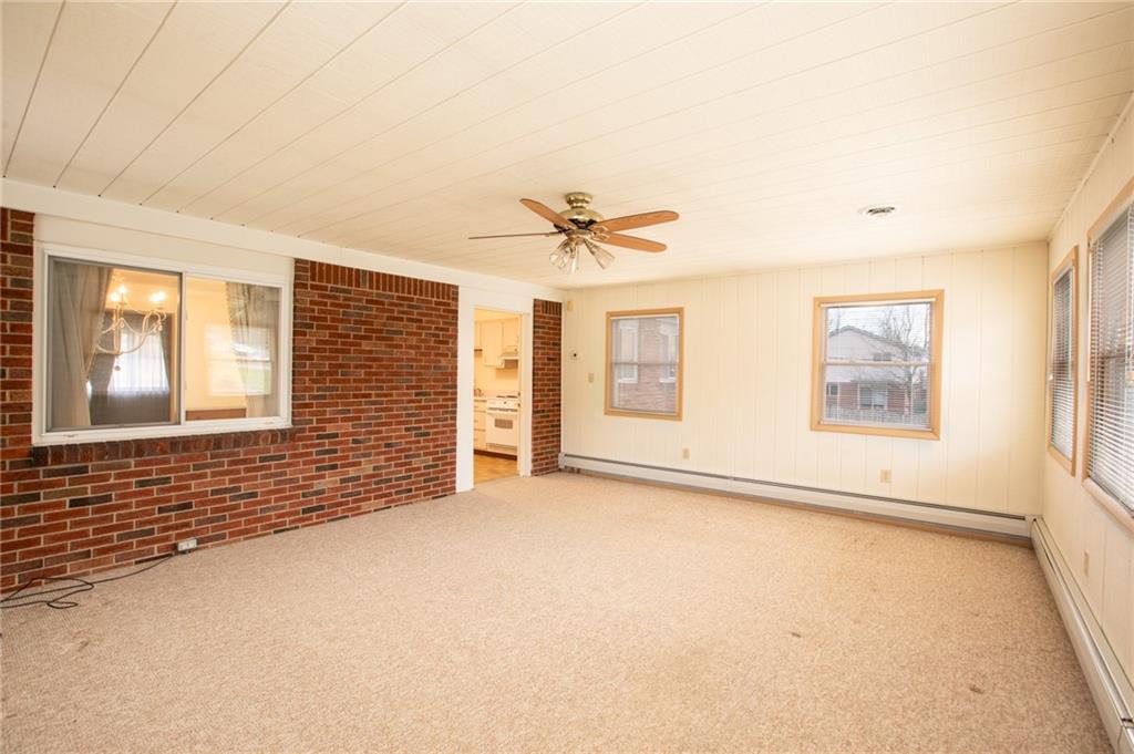 559 Wible Run Road Pittsburgh, PA 15209 - Photo 3 of 22 a view of an empty room with a window