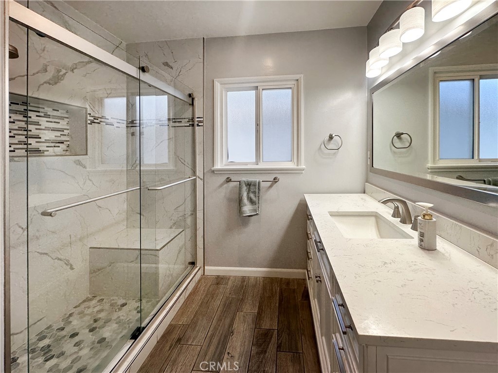 7508 Brookmill Road Downey, CA 90241 - Photo 12 of 20 a bathroom with a sink and shower