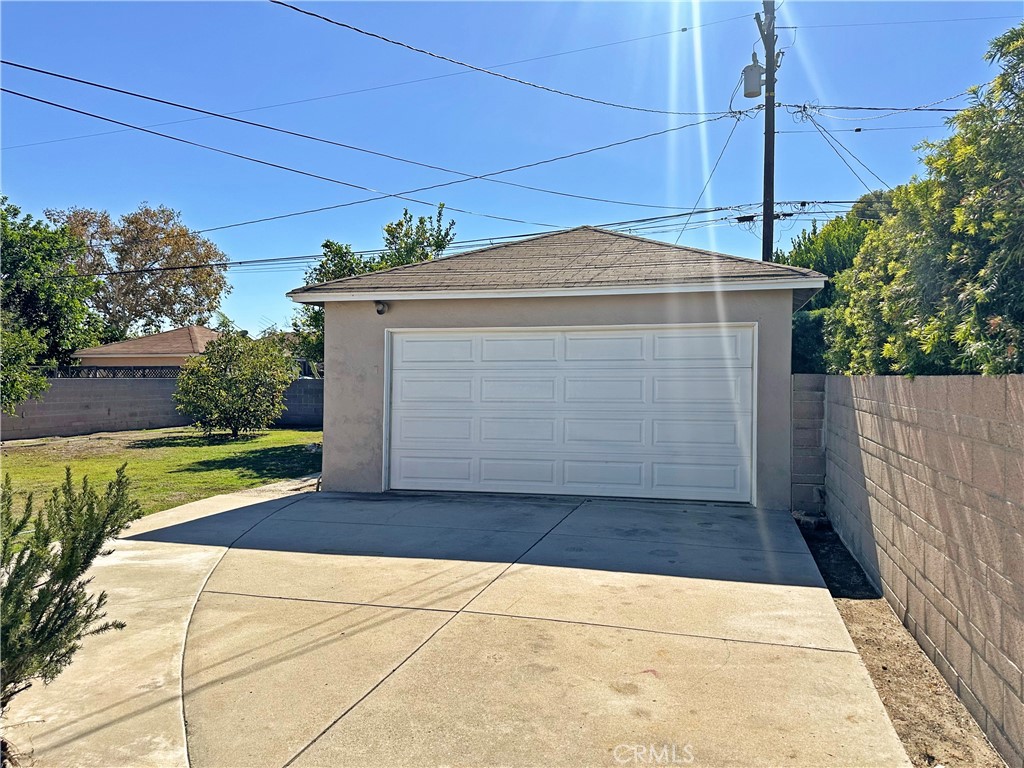7508 Brookmill Road Downey, CA 90241 - Photo 19 of 20 a front view of a house with a yard