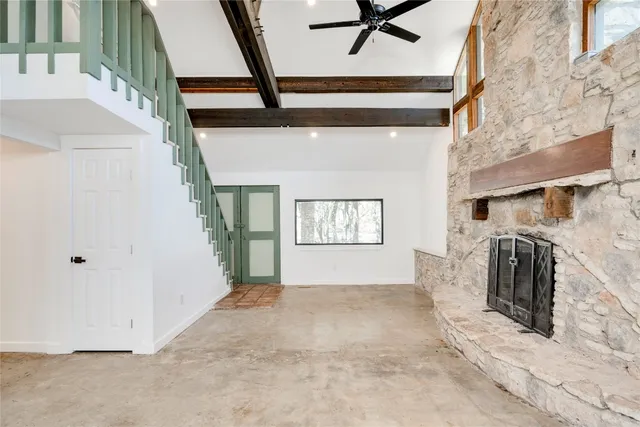 a view of a livingroom with a staircase