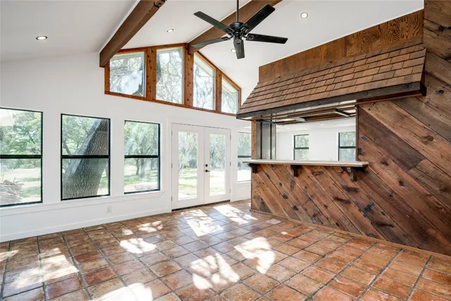 a view of a room with windows