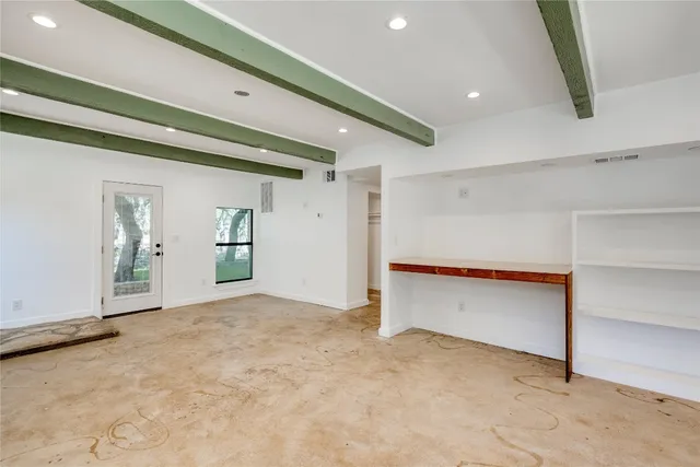 an empty room with windows