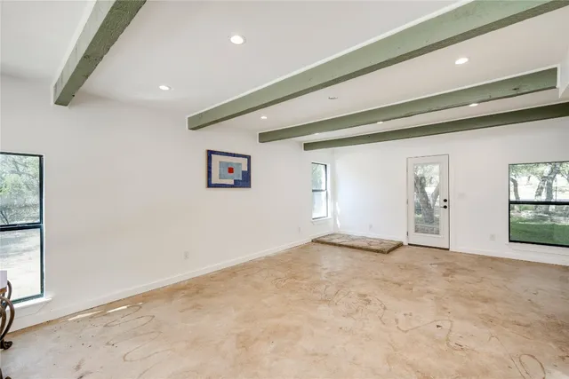 a bathroom with a sink a mirror and a shower