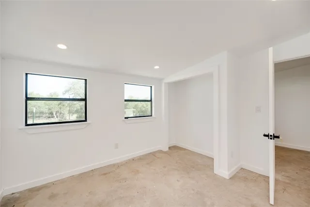 an entryway in room with a window