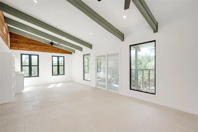 a view of a city with lush green forest