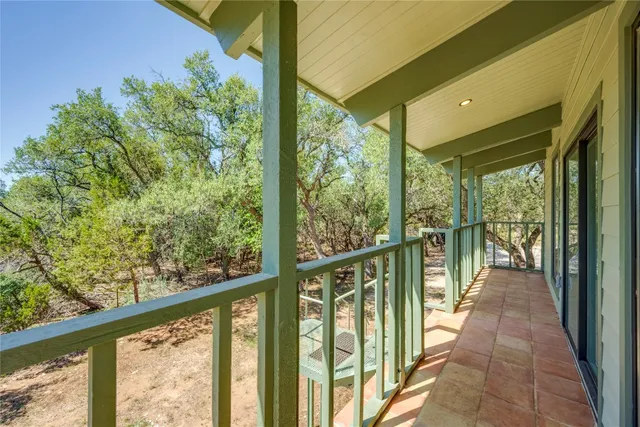 a view of a city street from a balcony