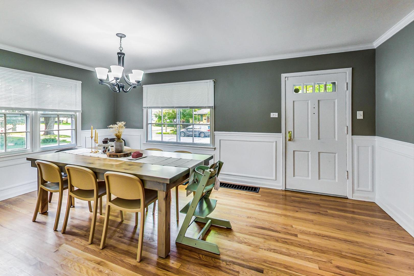 1216 Olive Road Homewood, IL 60430 - Photo 4 of 40 a view of a dining room with furniture and chandelier