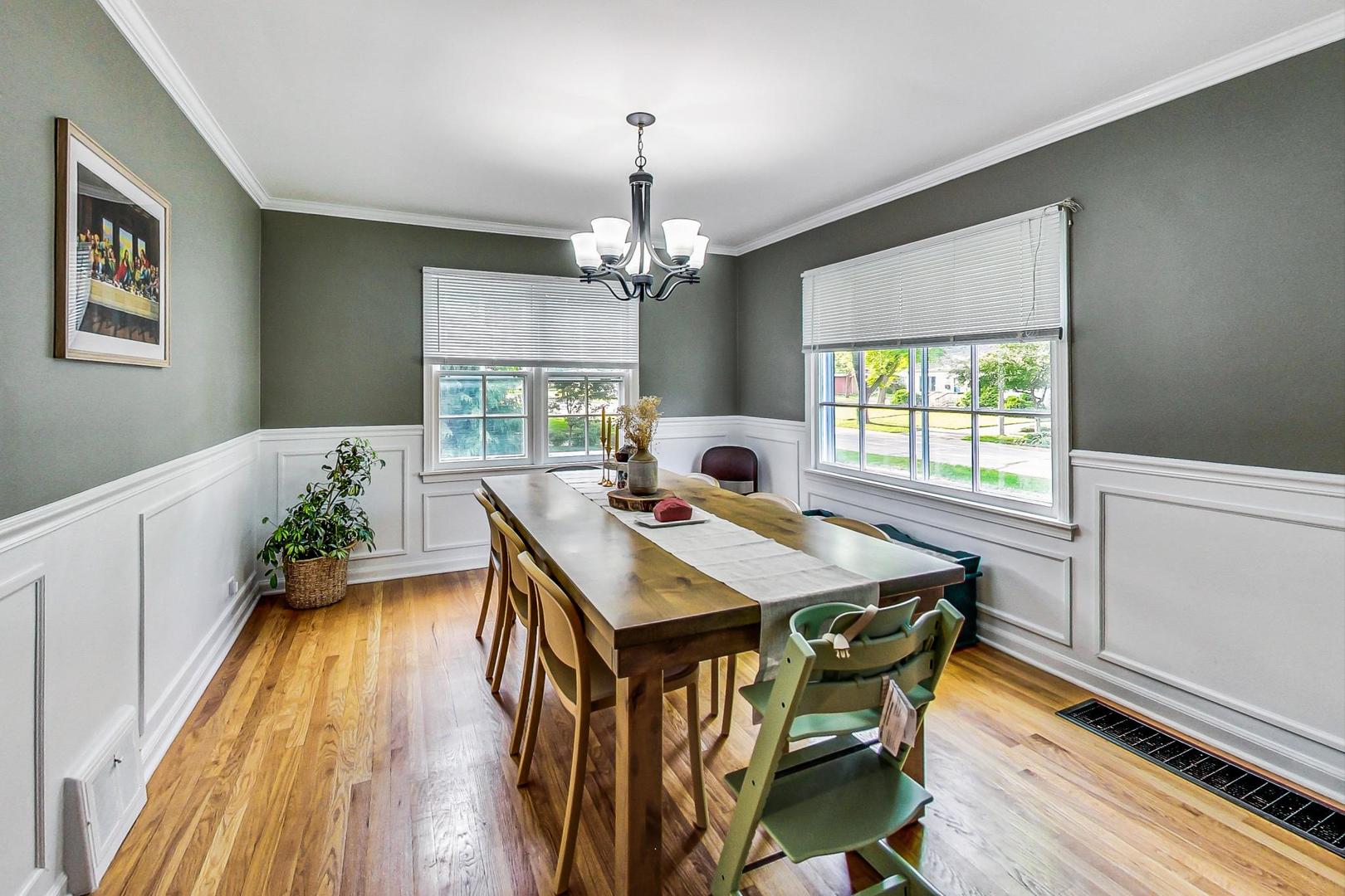 1216 Olive Road Homewood, IL 60430 - Photo 5 of 40 a view of a dining room with furniture window and wooden floor