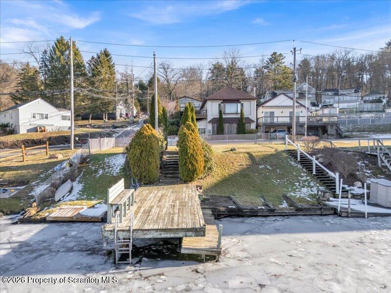 1228 Lake Road Factoryville, PA 18419 - Photo 39 of 43 a view of a house with a yard