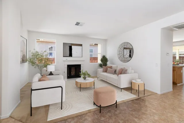 a living room with furniture and a rug