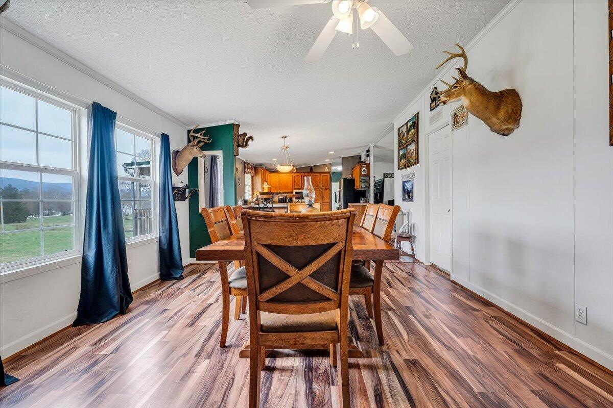 91 Homestead Road New Castle, VA 24127 - Photo 20 of 44 a dining room with furniture and wooden floor