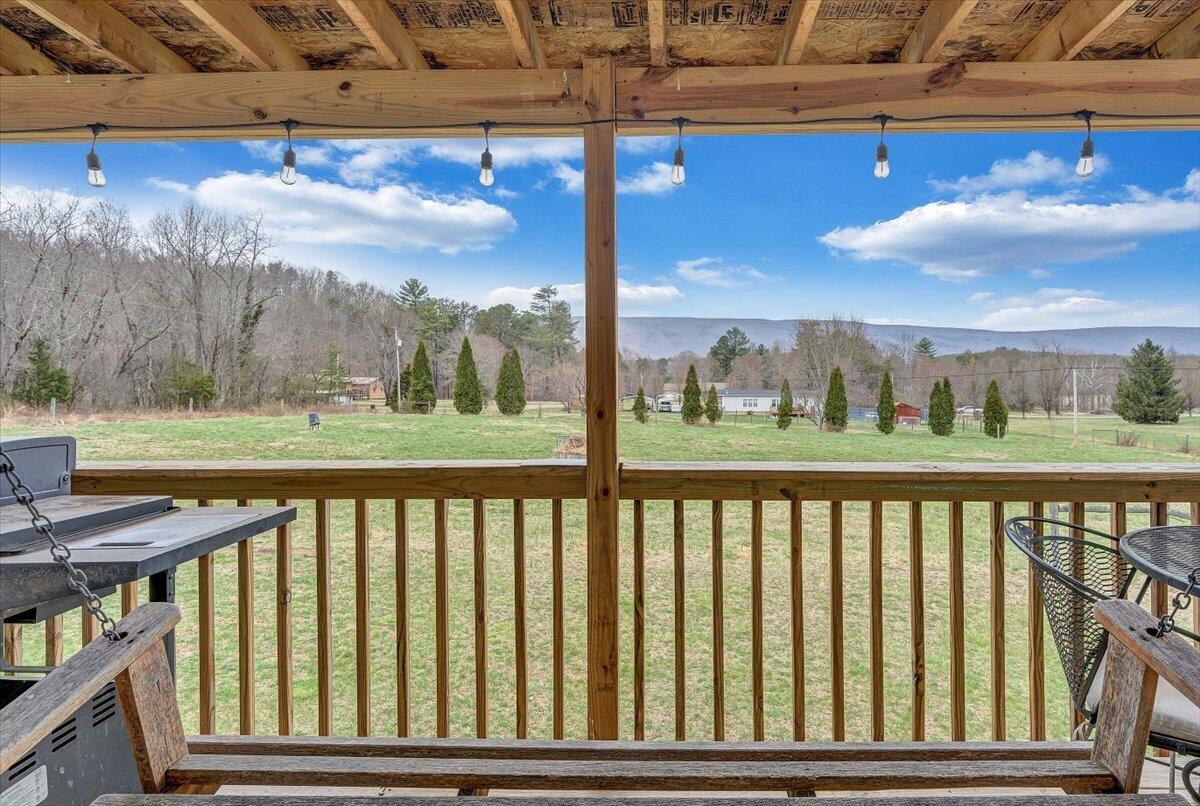 91 Homestead Road New Castle, VA 24127 - Photo 32 of 44 a view of a balcony with furniture and city view