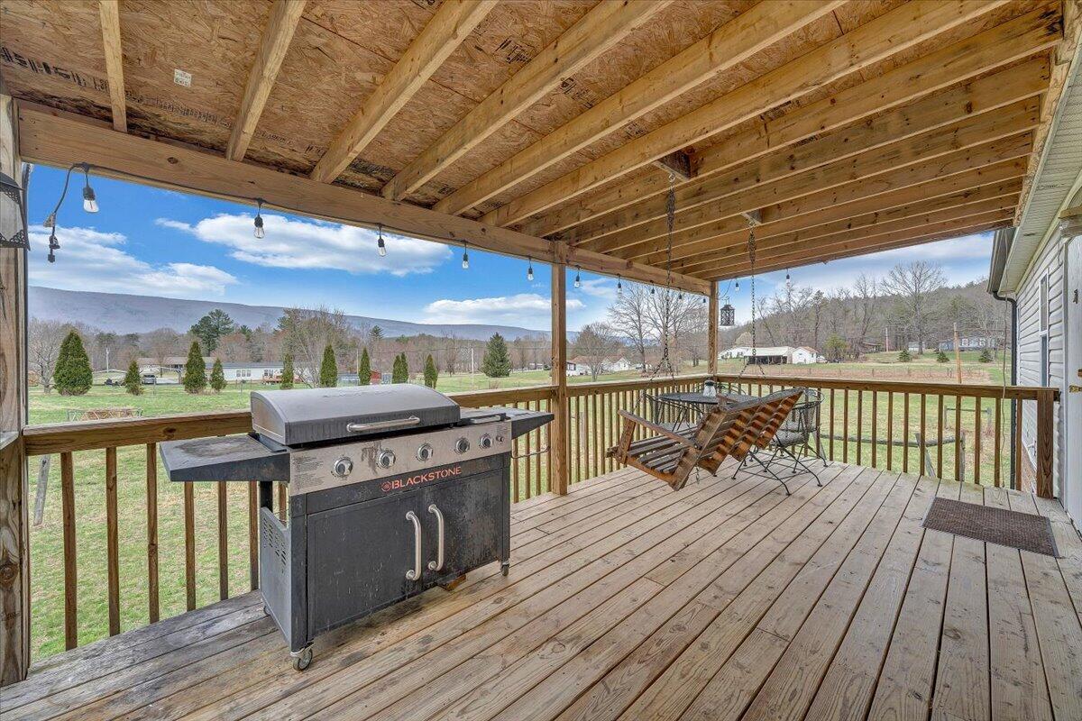 91 Homestead Road New Castle, VA 24127 - Photo 33 of 44 a view of a patio with wooden floor
