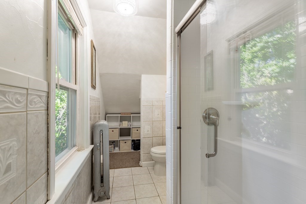 175 Hamilton Street Worcester, MA 01604 - Photo 15 of 21 a bathroom with a tub shower and sink