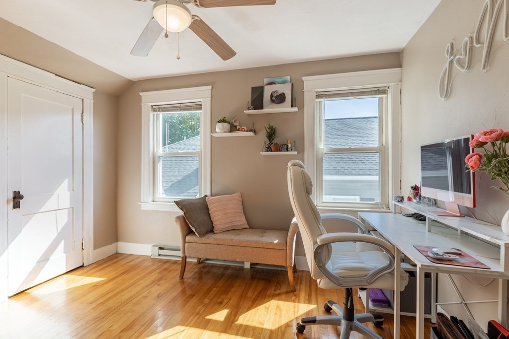 175 Hamilton Street Worcester, MA 01604 - Photo 18 of 21 a living room with furniture a flat screen tv and a window