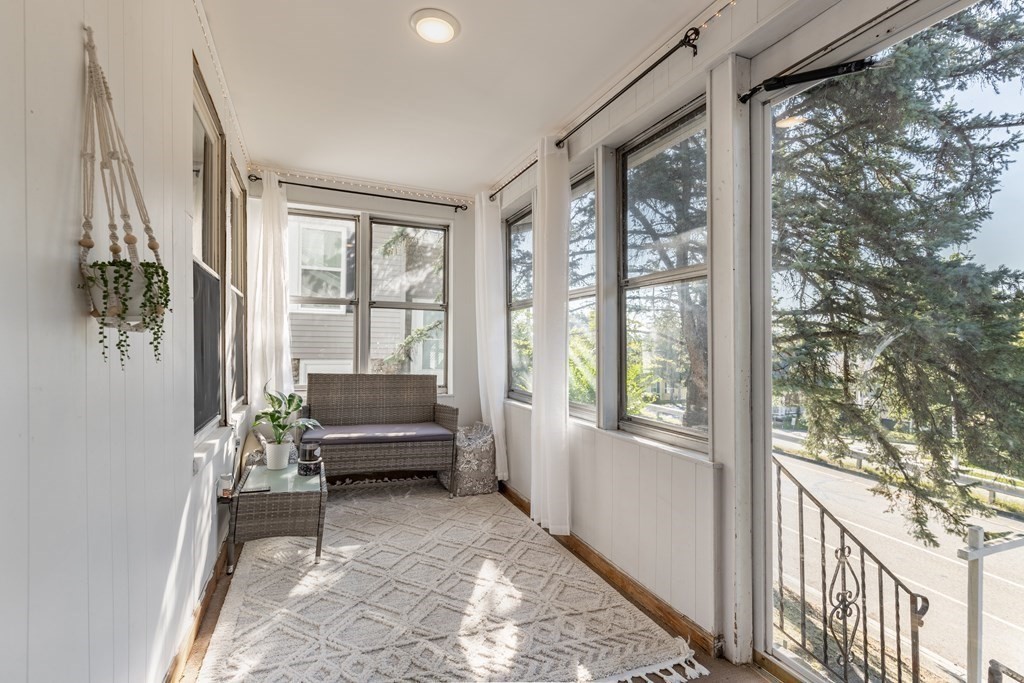175 Hamilton Street Worcester, MA 01604 - Photo 2 of 21 a living room with furniture and a large window